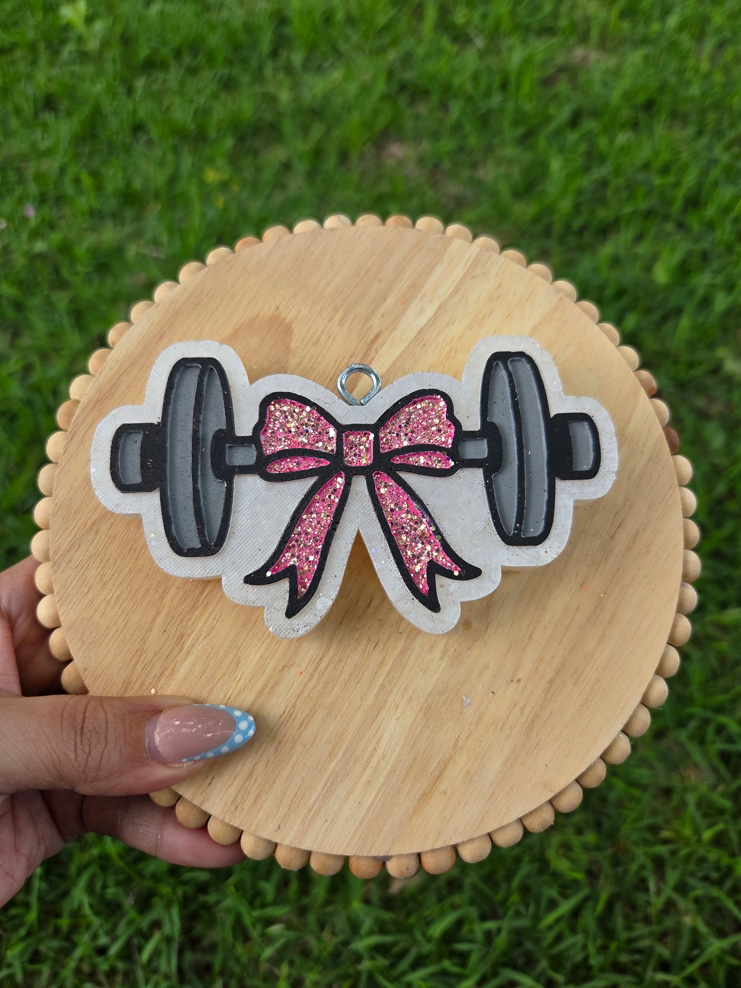 Bow dumbbell